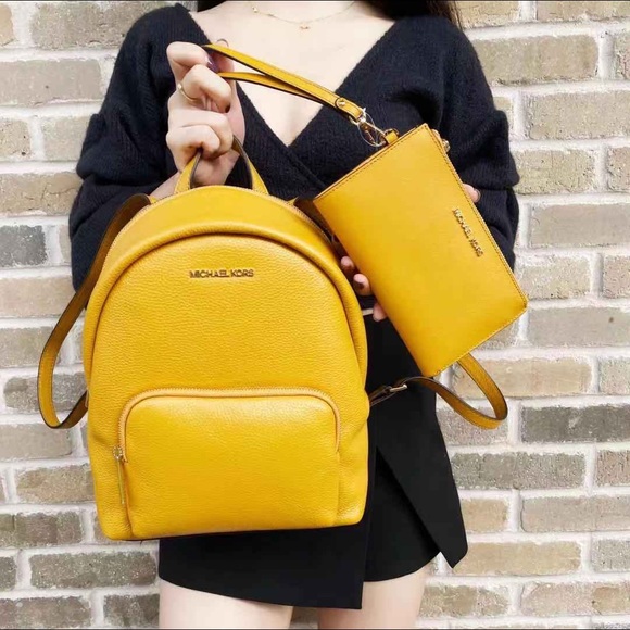 Michael Kors Handbags - NWT Michael Kors Backpack & Wallet💞